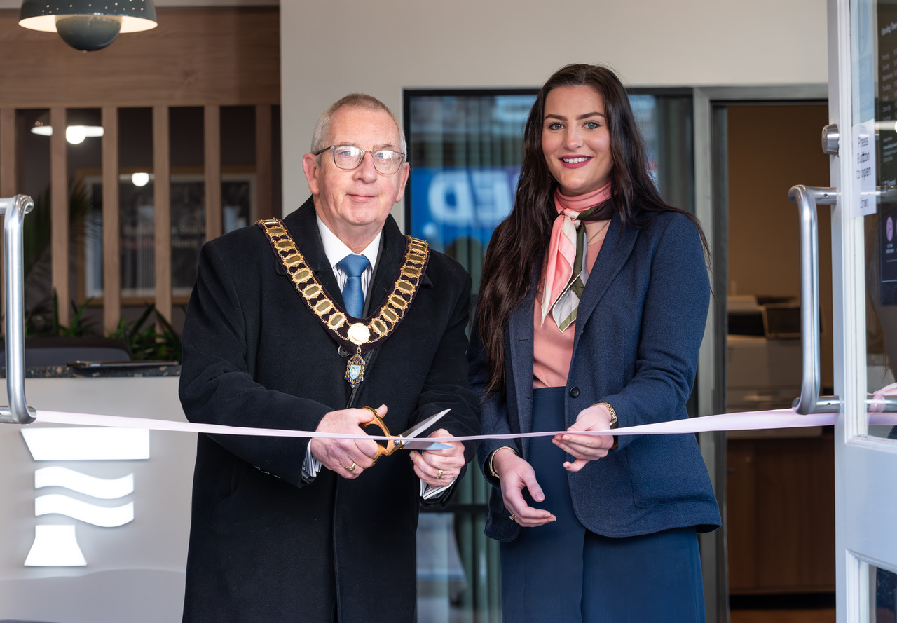 Mayor of Preston and Furness Preston branch manager cutting opening ribbon